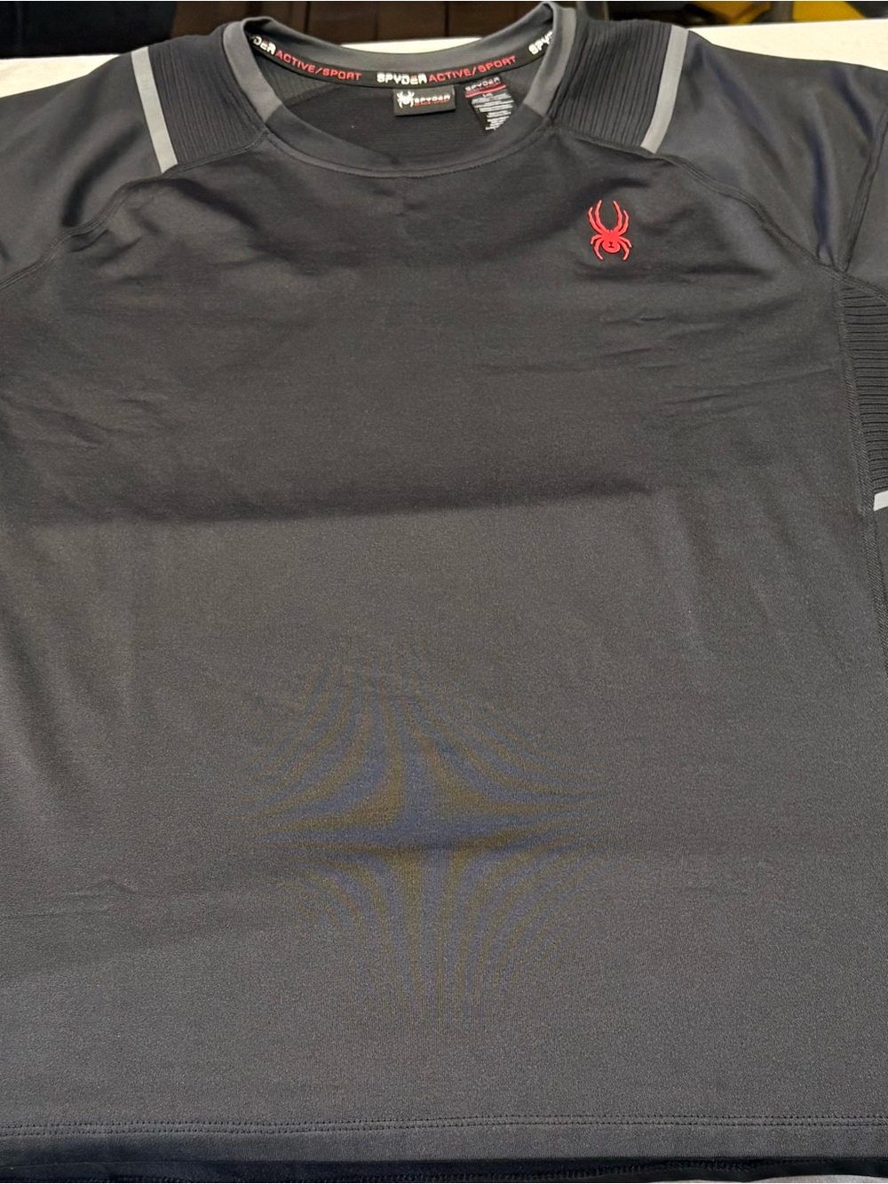 Spyder Men’s Black Performance Short-Sleeve Polo with Red Logo